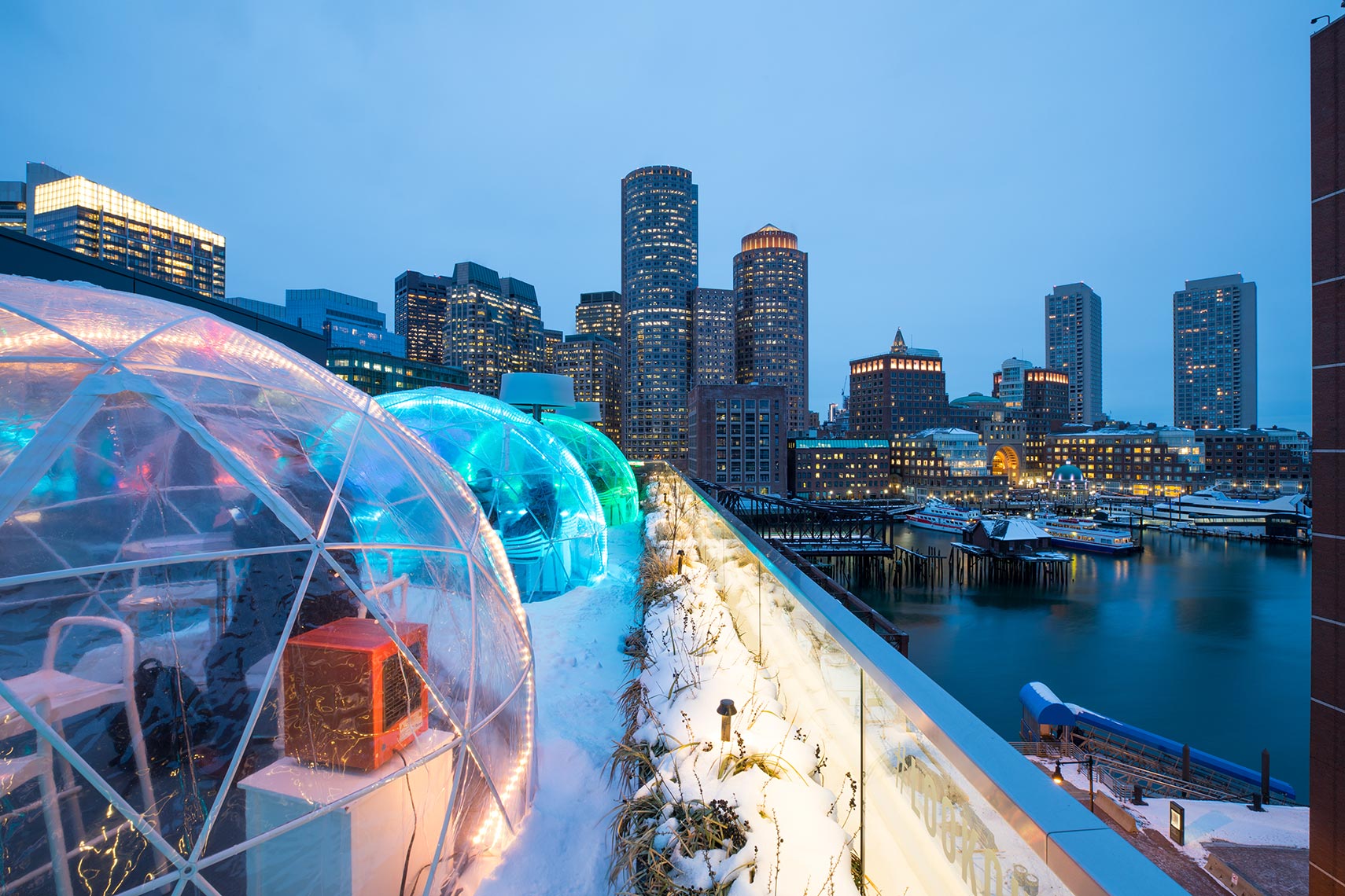 Igloos at Lookout Rooftop Bar with View of Boston Skyline By Best Hospitality Photographer Shannon O