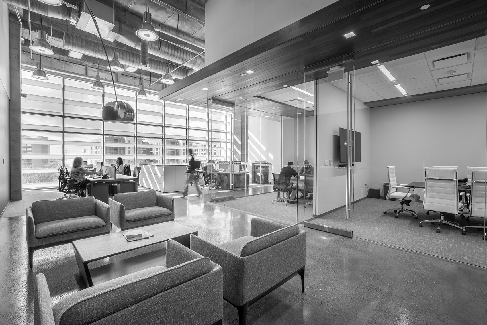 a black and whit photo of a modern office space by an Annual report photographer in Houston, Texas